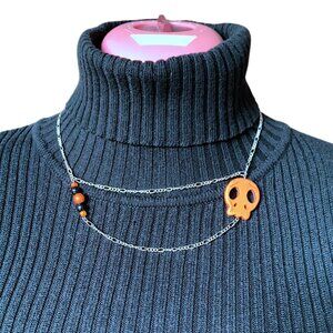 Creation - Short necklace asymmetrical skull double chains orange
